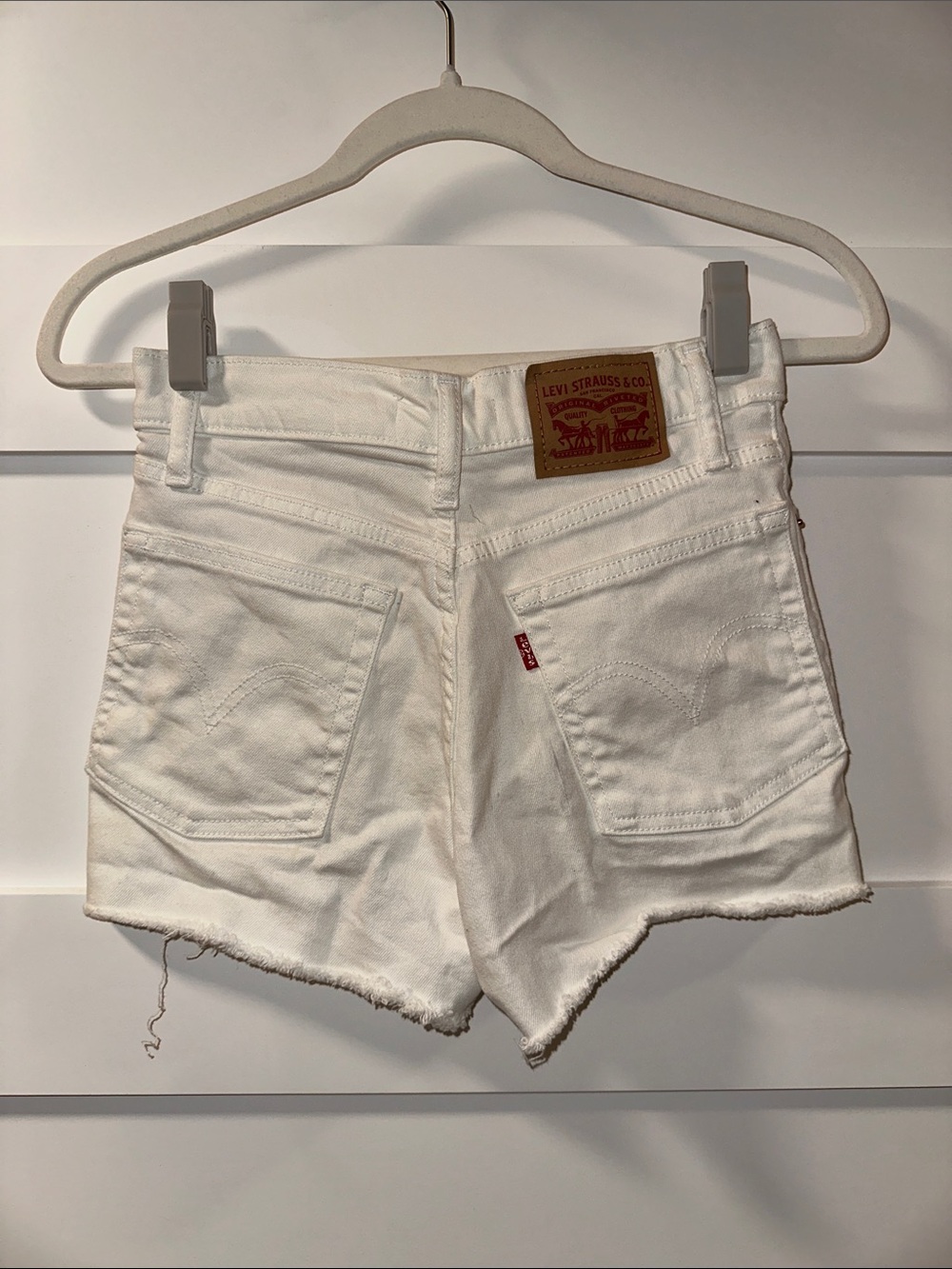 Levi's White Raw-Hem Denim Shorts